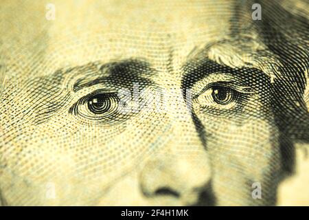 Close-up photo of Andrew Jackson's eyes on 20 dollar bills Stock Photo