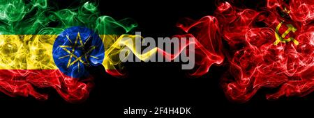 Ethiopia, Ethiopian vs USSR, Soviet, Russia, Russian, Communism smoky mystic flags placed side by side. Thick colored silky abstract smoke flags. Stock Photo