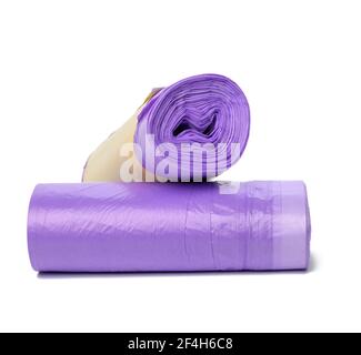 skein of purple plastic trash bags with strings isolated on white background, close up Stock Photo