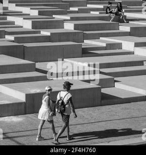 Madeira, Portugal. 09,05,2017     Tourist couple strolling along the harbour of Funchal on a sunny summer day. Stock Photo