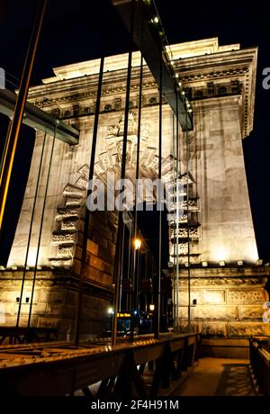 Budapest, Hungary, March 19, 2019: Chain Bridge buildings illuminated by floodlights at night in Budapest, Hungary Stock Photo