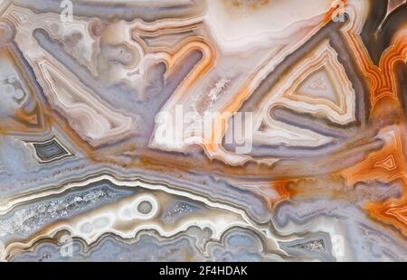 Macro photograph of the chaotic structure in a Crazy Lace agate from Mexico Stock Photo