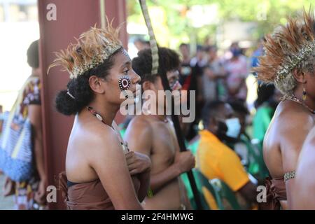 A Milne Bay lass dancing to escort guests at Divine Word University's 39th graduation in Madang, Papua New Guinea. Stock Photo