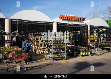 Shoppers at the nursery department in the Home Depot in Tigard, Ore., seen on Saturday, March 13, 2021, as springtime approaches amid the pandemic. Stock Photo
