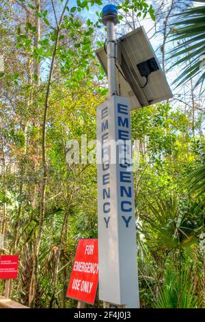 An emergency call station on the Boardwalk at the Ah-Tah-Thi-Ki Museum of the Seminole Tribe of Florida located off the Tamiami Trail in Clewiston, Fl Stock Photo