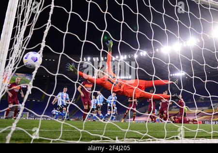 Rome, Italy. 21st Mar, 2021. Napoli's Dries Mertens scores during a Serie A football match between Roma and Napoli in Rome, Italy, March 21, 2021. Credit: Alberto Lingria/Xinhua/Alamy Live News Stock Photo