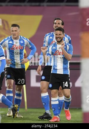 Rome, Italy. 21st Mar, 2021. Napoli's Dries Mertens (R) celebrates during a Serie A football match between Roma and Napoli in Rome, Italy, March 21, 2021. Credit: Alberto Lingria/Xinhua/Alamy Live News Stock Photo