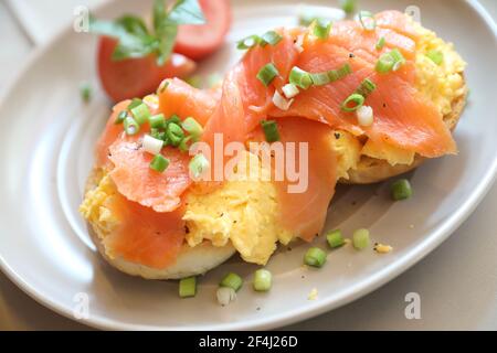 Scrambled eggs with smoked salmon on toast , Breakfast food Stock Photo