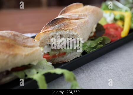 Beef sandwich on wood background Stock Photo