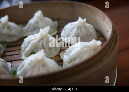 Dim sum dumpling on bamboo basket , Chinese food Stock Photo
