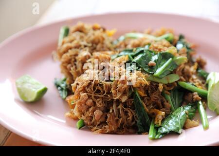 Stir fried Noodle with black soy sauce thai food Stock Photo