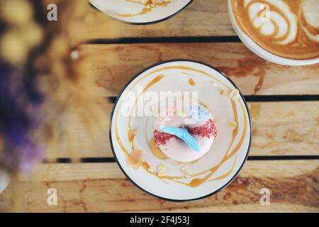 Fancy donut with cute mermaid on top Stock Photo