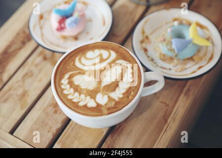 Fancy donut with cute mermaid on top Stock Photo