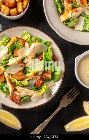 Caesar salad with chicken and Parmesan, shot from above Stock Photo