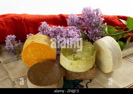 redbud flower and various soaps Stock Photo