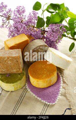 redbud flower and various soaps Stock Photo