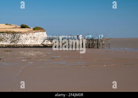 Traditional wooden fishing huts on stilts (Carrelet) near Talmont-sur-Gironde seaside town, south of Royan, Charente-Maritime (17), Nouvelle-Aquitaine Stock Photo