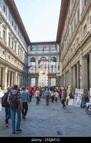 Tourists walking in the Uffizi Gallery in Florence Stock Photo