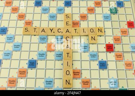 Seacation staycation on a scrabble board. UK Cruise holiday concept Stock Photo