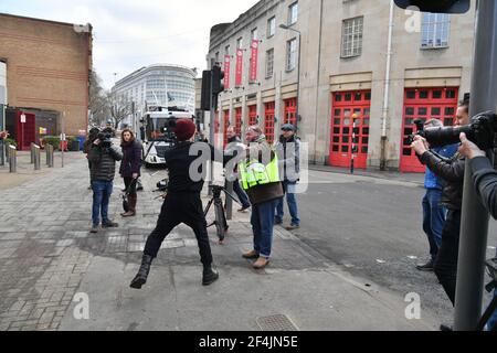 A man (red hat) argues with members of the media outside of Bridewell Police Station in Bristol. Protesters broke windows and vandalised the police station on Sunday after demonstrating against the Government's controversial Police and Crime Bill. Picture date: Monday March 22, 2021. Stock Photo