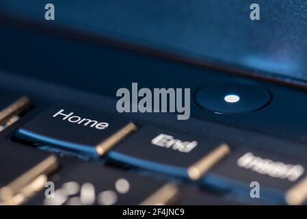 Macro shot of black keyboard focus on home key Stock Photo