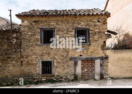 Old abandoned house in the village of Horcajuelo de la Sierra in Madrid. Rural exodus concept Stock Photo