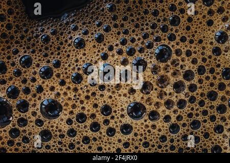 Macro shot of espresso foam. Coffee background. Stock Photo
