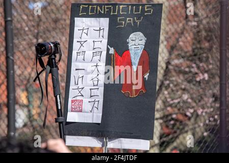 New York, United States. 21st Mar, 2021. A placard that says Confucius Say Stop Asian Hate seen at a rally against hate in Columbus Park in the Chinatown neighbourhood of Manhattan in New York City.A rally for solidarity was organized in response to a rise in hate crimes against the Asian community since the start of the coronavirus (COVID-19) pandemic in 2020. On March 16 in Atlanta, Georgia, a man went on a shooting spree in three spas that left eight people dead, including six Asian women. Credit: SOPA Images Limited/Alamy Live News Stock Photo
