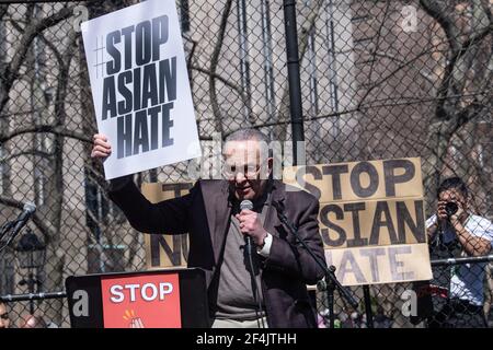 Senate Majority Leader Chuck Schumer (D-NY) holds a placard that says Stop Asian Hate as he speaks during a rally against hate in Columbus Park in the Chinatown neighbourhood of Manhattan in New York City.A rally for solidarity was organized in response to a rise in hate crimes against the Asian community since the start of the coronavirus (COVID-19) pandemic in 2020. On March 16 in Atlanta, Georgia, a man went on a shooting spree in three spas that left eight people dead, including six Asian women. (Photo by Ron Adar/SOPA Images/Sipa USA) Stock Photo