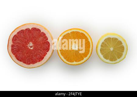 Fresh ripe grapefruits isolated on white background Stock Photo