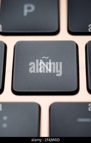 Spanish letter on a gray laptop keyboard. Stock Photo