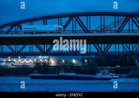 Beeckerwerther bridge, motorway bridge, A42, truck, Haus-Knipp railway bridge, cargo ship on the Rhine, in Duisburg, NRW, Germany, Stock Photo