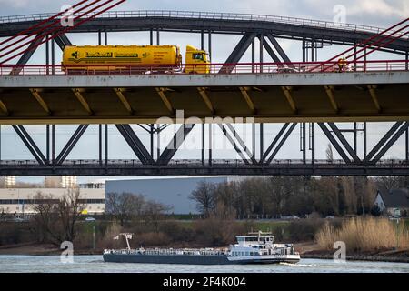 Beeckerwerther bridge, motorway bridge, A42, truck, Haus-Knipp railway bridge, cargo ship on the Rhine, in Duisburg, NRW, Germany, Stock Photo