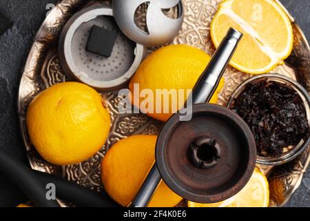 Empty hookah shaft close up on table with fresh fruit Stock Photo