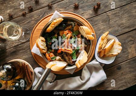 Assorted seafood basket bowl with toasted bread  Stock Photo