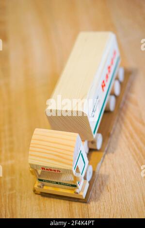 POZNAN, POLAND - Apr 01, 2016: Wooden Raben company truck with trailer miniaure model Stock Photo