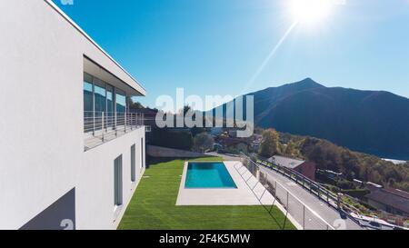 Modern luxury villa with garden and swimming pool Stock Photo