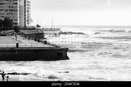 CAPE, SOUTH AFRICA - Mar 13, 2021: Cape Town, South Africa - October 15, 2019: View of Pavilion Public Swimming Pool on Sea Point promenade in Cape To Stock Photo