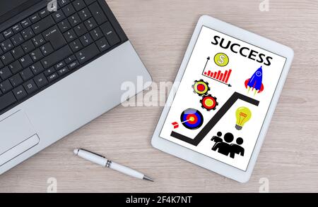 Success concept shown on a digital tablet Stock Photo
