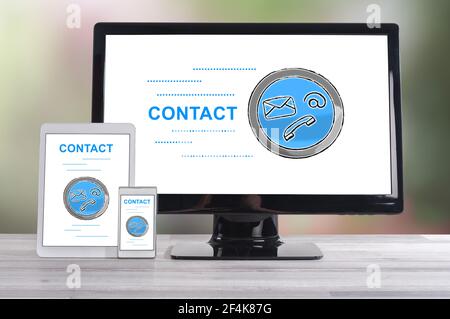Contact concept shown on different information technology devices Stock Photo