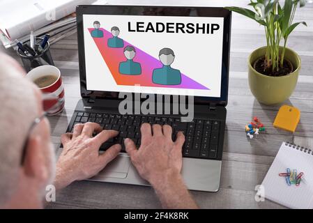 Leadership concept shown on a laptop used by a man Stock Photo