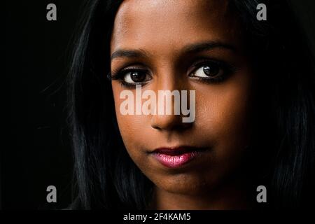 Tilburg, Netherlands. Studio Portrait of a young, coloured woman born in Sri Lanka and adopted by Dutch surrogate parents. Stock Photo