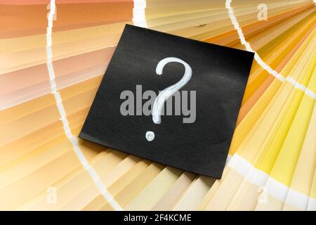 Question mark as symbol of choose color from color palette for renovation. Stock Photo