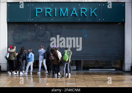 File photo dated 29/06/20 of people queueing outside the Primark store on Princes Street in Edinburgh, when it reopened as part of Scotland's phased plan to ease out of the coronavirus pandemic lockdown.Tuesday marks the first anniversary of the announcement on March 23, 2020 of the first UK-wide lockdown. Issue date: Monday March 22, 2021. Stock Photo