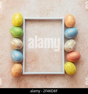 Happy easter background. Frame for text with easter eggs. Easter card with copy space for text. Stock Photo