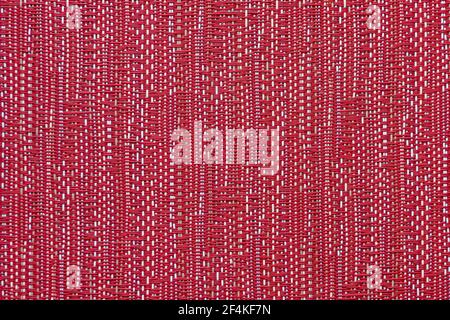 Red and white linen fabric texture background. Closeup of red textile material as texture or background. Magenta artificial rough cloth texture Stock Photo