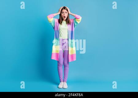 Photo of scared brown haired beautiful wife hold cheese grater bite lip  wear dotted apron purple bathrobe isolated on pink color background Stock  Photo - Alamy