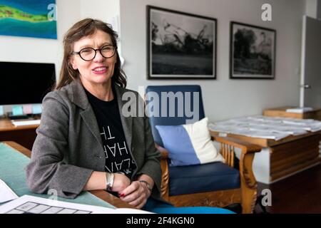 Peekskill, New York, USA. Female artist, Melinda Hunt, giving an interview about her work on The Hart Island Project from her studio. Stock Photo