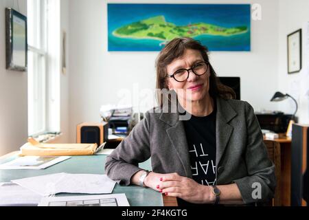 Peekskill, New York, USA. Female artist, Melinda Hunt, giving an interview about her work on The Hart Island Project from her studio. Stock Photo