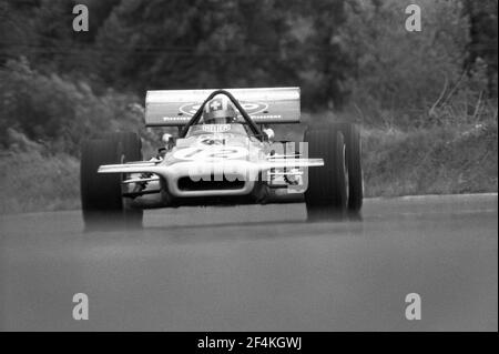 Jo SIFFERT driving March-Ford F1 car in full speed during 1970 Grand Prix de France, in Charade circuit near Clermont-Ferrand. Stock Photo